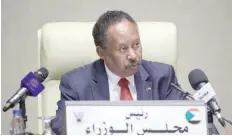  ?? — AFP ?? Sudan’s Prime Minister Abdalla Hamdok chairs a cabinet meeting in Khartoum on Tuesday.