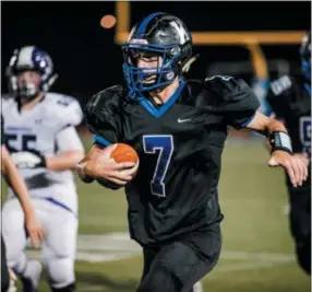  ?? NATE HECKENBERG­ER — FOR DIGITAL FIRST MEDIA ?? Kennett’s Sam Forte races down the sideline for a gain in the second quarter Thursday night.