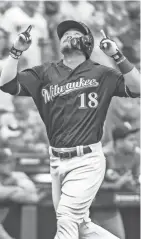  ?? USA TODAY SPORTS BENNY SIEU / ?? Brewers second baseman Keston Hiura celebrates his solo home run in the third inning Saturday night.