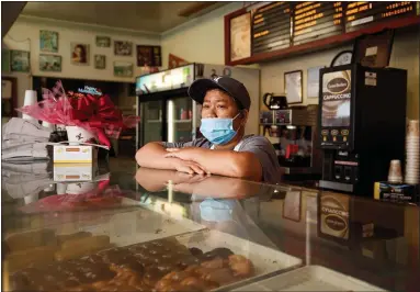  ?? RANDY VAZQUEZ — STAFF PHOTOGRAPH­ER ?? Soktea Hok, at her Gilroy shop Monday, mourns her daughter, Kim, who died Thursday: “She’s my best friend. She’s my everything.”