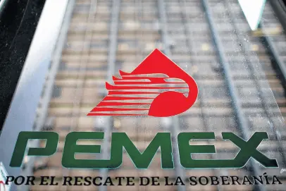  ?? RAQUEL CUNHA • REUTERS FILE PHOTO ?? The logo of Petroleos Mexicanos (Pemex) is pictured at the company's headquarte­rs in Mexico City, Mexico July 26, 2023.