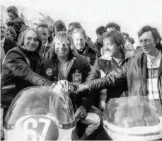  ??  ?? From left: Alex George and Croxford on Slippery Sam (winners) with Chas Mortimer and Billy Guthrie (second) in the 1975 10-lap Production TT