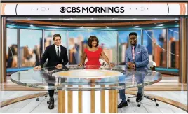  ?? Photos and text from The Associated Press ?? “CBS Mornings” hosts, from left, Tony Dokoupil, Gayle King and Nate Burleson on the set in New York on Aug. 30.