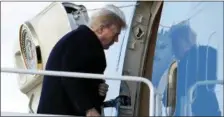  ?? THE ASSOCIATED PRESS ?? President Donald Trump boards Air Force One on Friday in Andrews Air Force Base, Md., en route to Palm Beach Internatio­nal Airport in West Palm Beach, Fla.