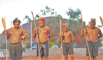  ??  ?? Local performers dance during the opening ceremony for the National Indigenous Constituti­onal Convention at Mutitjulu near Uluru in central Australia. — Reuters photo