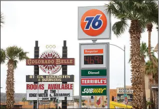  ?? ?? Higher state and local taxes are among the reasons gas costs more at the 76 station in Laughlin, compared with the Sam’s Club across the state line in Bullhead City.