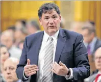  ?? CP PHOTO ?? Minister of Fisheries, Oceans and the Canadian Coast Guard Dominic LeBlanc rises in the House of Commons during Question Period in Ottawa on June 11. The federal ethics commission­er says LeBlanc was in a conflict of interest when he approved an Arctic surf clam licence to a company that employed a family member.