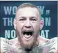  ?? Julio Cortez Associated Press ?? BRASH Conor McGregor has personalit­y that can help sell the big bout.