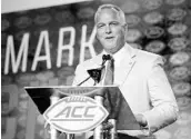  ?? CHUCK BURTON/ASSOCIATED PRESS ?? Miami coach Mark Richt, speaking to the media during the ACC kickoff session on Friday, faces a QB decision.