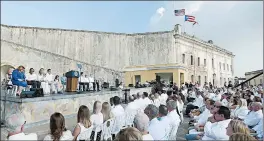  ?? CARLOS GIUSTI/AP ?? Hundreds attend a remembranc­e ceremony Thursday in San Juan, Puerto Rico.