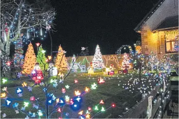  ?? ?? GARDEN GLOW: Brian Jemmett’s festive display in Brechin’s Jenner Place.