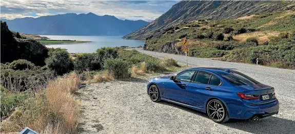  ?? DAVID LINKLATER/ STUFF ?? Lake Hawea, 1920km: passing water.