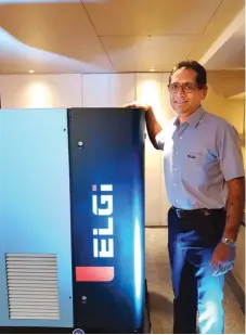  ??  ?? Jairam Varadaraj, Managing Director, Elgi Equipments along with the newly launched EG 22 air compressor