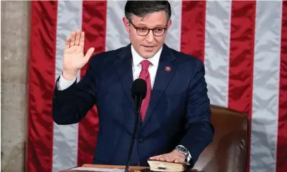  ?? ?? Newly elected speaker of the US House, Mike Johnson takes his oath of office. Photograph: AlexBrando­n/AP