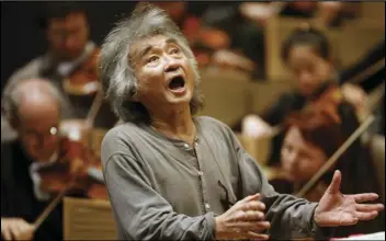  ?? ASSOCIATED PRESS ?? Former director of the Boston Symphony Orchestra Seiji Ozawa conducts the orchestra during a rehearsal of Berlioz’s “Symphonie Fantastiqu­e” at Symphony Hall in Boston on Nov. 26, 2008.