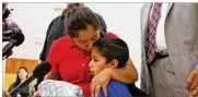  ?? THALIA JUAREZ / BALTIMORE SUN MEDIA ?? Beata Mariana de Jesus Mejia-Mejia is reunited June 22 with son Darwin, 7, at Baltimore-Washington Internatio­nal Thurgood Marshall Airport.