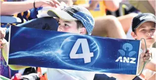  ?? PHOTOS: ODT FILES ?? Cheering them on . . . James Higgins (8) celebrates a boundary at the match between New Zealand and England in Dunedin in March.