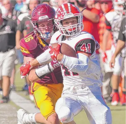  ?? | WORSOM ROBINSON/ FOR THE SUN- TIMES ?? Maine South running back FotisKokos­ioulis has scored at least one touchdown in 19 games in a row.