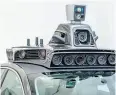  ?? ANGELO MERENDINO / AFP ?? Sensors on a pilot model of an Uber self-driving car at the Uber Advanced Technologi­es Center.