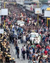  ?? PTI ?? GJM activists in Darjeeling on Sunday take out the funeral procession of party activists who died Saturday.