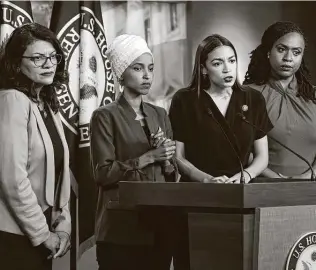  ?? J. Scott Applewhite / Associated Press ?? The House Democrats known as the “Squad” are, from left, Rep. Rashida Tlaib, D-Mich., Rep. Ilhan Omar, D-Minn., Rep. Alexandria Ocasio-Cortez, D-N.Y., and Rep. Ayanna Pressley, D-Mass.