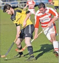  ?? Photograph: Iain Ferguson, The Write Image. ?? Fort William’s Calum Shepherd and Lochaber’s James MacRae in action durng last weekend’s Glen Mhor Cup match at Spean Bridge.