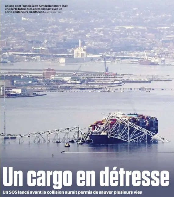  ?? PHOTO REUTERS ?? Le long pont Francis Scott Key de Baltimore était une perte totale, hier, après l’impact avec un porte-conteneurs en difficulté.