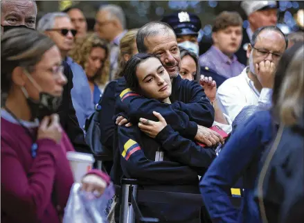  ?? CHIP SOMODEVILL­A/POOL VIA AP ?? Family members and loved ones of victims and other mourners attend Saturday’s ceremonies to commemorat­e the 20th anniversar­y of the Sept. 11 terrorist attacks at the National September 11 Memorial & Museum in New York.