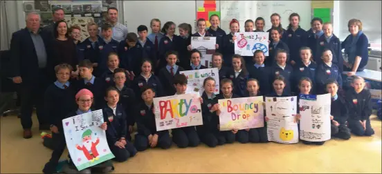  ??  ?? Fifth class students of Ovens NS with their teachers, Bizworld tutor Margaret Barrett and dragons Michael O’Leary and Tom Purcell who took part in the recent twoday Bizworld workshop.