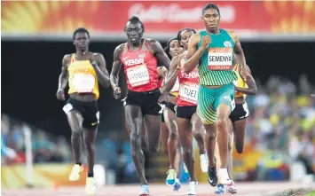  ?? Picture: AFP ?? GOLDEN GIRL. Caster Semenya leads in the women’s 800m final during the Gold Coast Commonweal­th Games at Carrara Stadium in Australia two weeks ago.