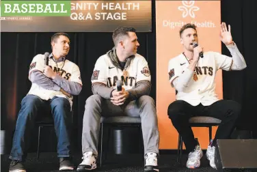  ?? Michael Short / Special to The Chronicle ?? Alex Dickerson (left) and Buster Posey listen as Hunter Pence speaks on stage Saturday during FanFest.