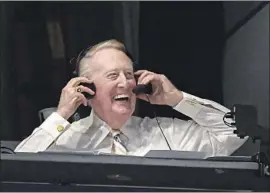  ?? Mark J. Terrill Associated Press ?? VIN SCULLY, shown in 2016, knows a title without “50,000 going wild” at Dodger Stadium won’t be the same but said baseball has provided a good outlet for fans.