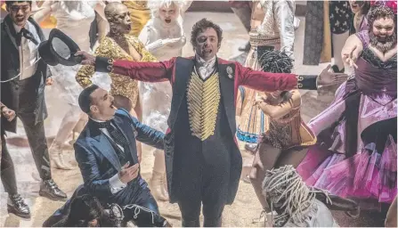  ??  ?? Hugh Jackman in The Greatest Showman (above) and Jack Black in Jumanji (right).