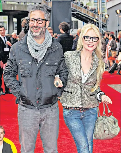  ?? ?? Comedian David Baddiel, pictured with his wife Morwenna Banks, criticised the choice of name. Inset, Arthur Darvill, whose character Hershel Fink will now be Henry Finn