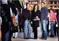  ?? RICHARD LAUTENS/TORONTO STAR ?? Behind the lenses, among other things, of The Neutrino Video Project Toronto are, from left, producer Carmine Lucarelli, executive producer Jen Radomsky and producer David Ivkovic.