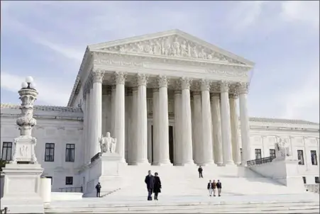  ?? THE ASSOCIATED PRESS ?? The U.S. Supreme Court building will be the center of momentous decision this week. Among the cases are the proposed travel ban.