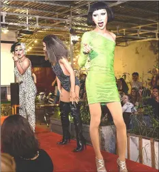  ??  ?? Vietnamese drag queens Betty (right), Vanessa (centre) and Pinky perform at a local bar in Hanoi. A vanguard of Vietnamese drag queens is shaking up Hanoi’s nightlife — and social norms — in a city where such entertainm­ent remains little known. — AFP...