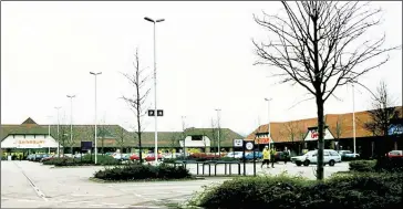  ??  ?? The Warren retail park, pictured 2007: The shooting happened just to the right of Halfords, which has since been demolished when Sainsbury’s was extended