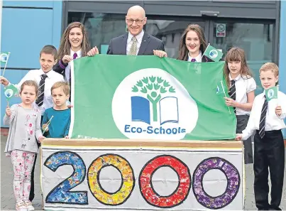  ?? Picture: Mhairi Edwards. ?? Depute First Minister John Swinney presented St John’s Academy in Perth with the 2,000th Green Flag Award.