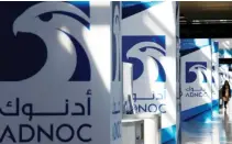  ??  ?? ADNOC logos seen at Gastech, the world’s biggest expo for the gas industry, in Chiba, Japan, on April 4. (Reuters)