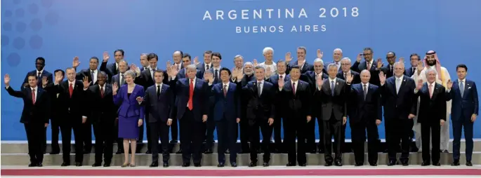  ?? Saudi Crown Prince Mohammed bin Salman with world leaders at the G20 Summit in Buenos Aires on Friday. ??