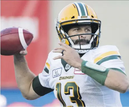  ?? GRAHAM HUGHES/THE CANADIAN PRESS FILES ?? Edmonton Eskimos quarterbac­k Mike Reilly is less than 100 yards away from a 5,000-yard passing season, which is becoming old hat for the CFL’s most outstandin­g player.