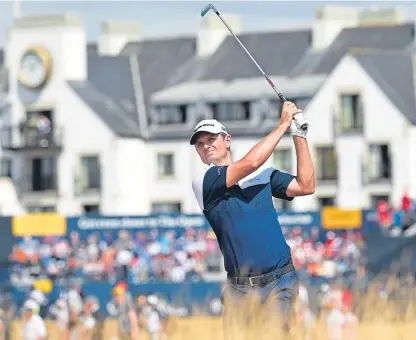  ?? Picture: Getty. ?? Justin Rose plays his second shot on the first hole during the final round.