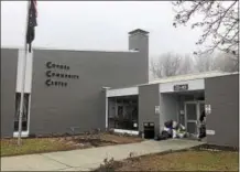  ?? NICHOLAS BUONANNO — NBUONANNO@TROYRECORD.COM ?? Bags of donations for victims of Thursday’s Remsen Street fire sit outside the entrance to the Cohoes Community Center on Monday morning.