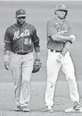  ?? JIM RASSOL/USA TODAY SPORTS ?? St. Louis’ Paul Goldschmid­t stands at second base after hitting a double during a spring training game against the Mets.