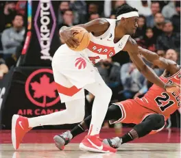  ?? FRANK GUNN/AP ?? Raptors forward Pascal Siakam (43) is fouled by Bulls guard Patrick Beverley (21) during the first half on Tuesday.