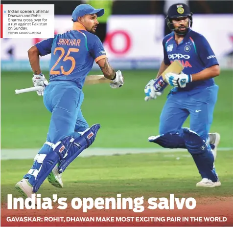  ?? Virendra Saklani/Gulf News ?? Indian openers Shikhar Dhawan and Rohit Sharma cross over for a run against Pakistan on Sunday.