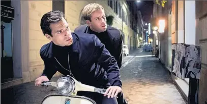  ?? Daniel Smith Warner Bros. ?? HENRY CAVILL, left, as Napoleon Solo and Armie Hammer as Illya Kuryakin in the updated “The Man From U.N.C.L.E.”