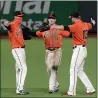  ?? ANDA CHU — BAY AREA NEWS GROUP, FILE ?? Giants outfielder­s Steven
Duggar (6), Mike Yastrzemsk­i (5) and Austin Slater (13) celebrate at Oracle Park on July 31.