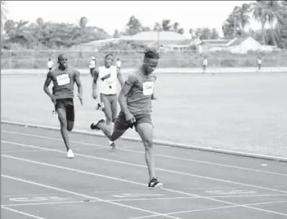  ?? ?? Ezekiel Newton will be one to watch as the muscular Bladen Hall student, stormed his way to 200m gold after going a shade above 11 seconds on Saturday to win the blue riband 100m final. (Emmerson Campbell photo)